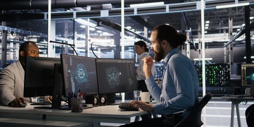 IT technician troubleshooting computer systems and network equipment in an office environment.